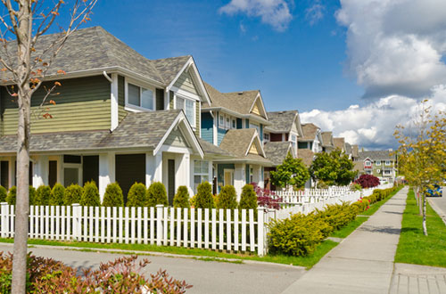 Row of modern homes on a quiet suburban neighborhood
